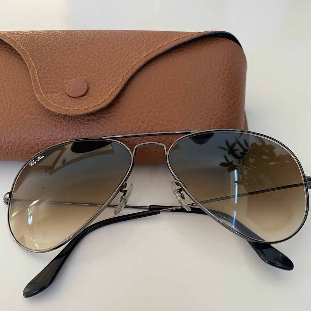 Ray-Ban brown Aviators.